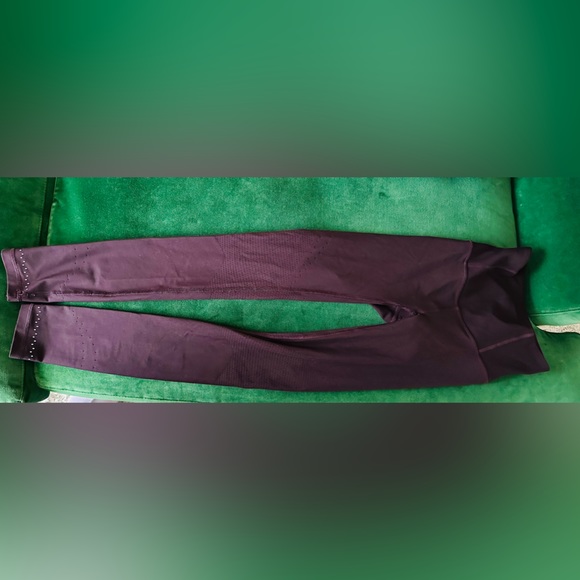 Lululemon running tight with aerated detailing on legs-size 2-Burgundy/Maroon - Picture 2 of 3